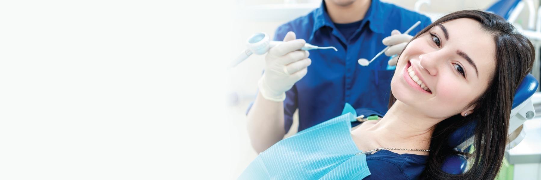 Girl smiling in exam room at Arcadia dentistry 