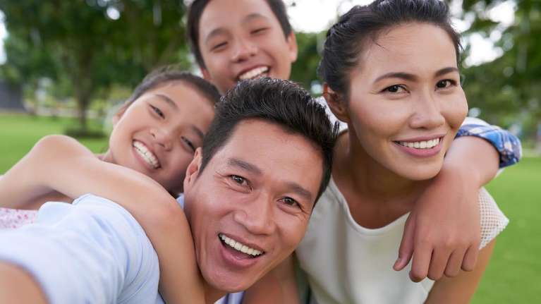 Family in Arcadia confidently smiling with their cavity free teeth