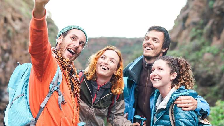 group of hikers smiling