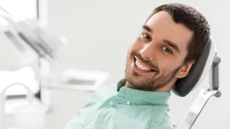 Man smiling after root canal
