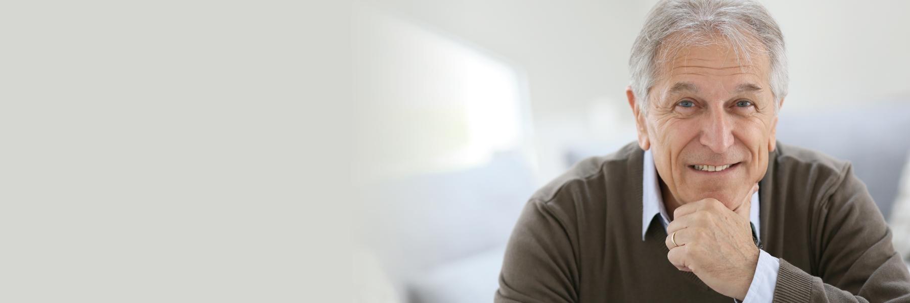 senior man smiling with a tooth colored filling in Phoenix